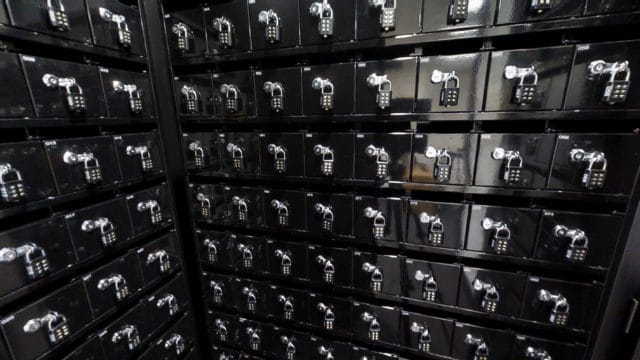 Rows of mailboxes for individual office addresses